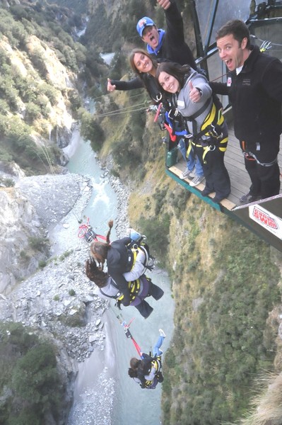 Regina Monaf and Anna Delooze from The Station Information Centre are among the first to check out the Tandem Cliff Jump at Shotover Canyon Swing